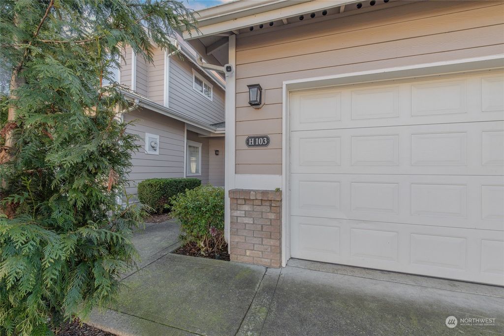 Photo of 10700 SE 260th Street #H103, Kent, WA 98030 (MLS # 2328980)