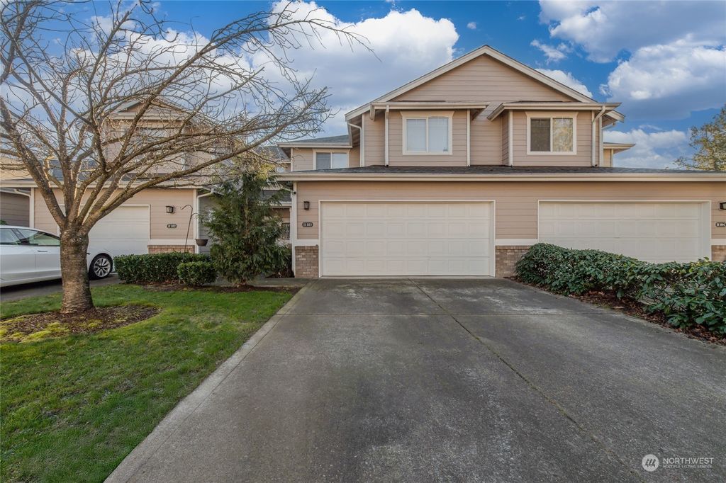 Photo of 10700 SE 260th Street #H103, Kent, WA 98030 (MLS # 2328980)