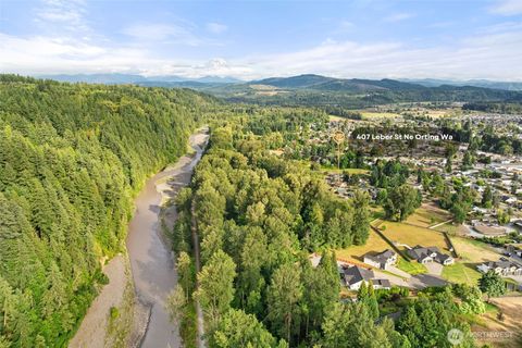 Photo of 407 Leber Street NE, Orting, WA 98360 (MLS # 2404261)