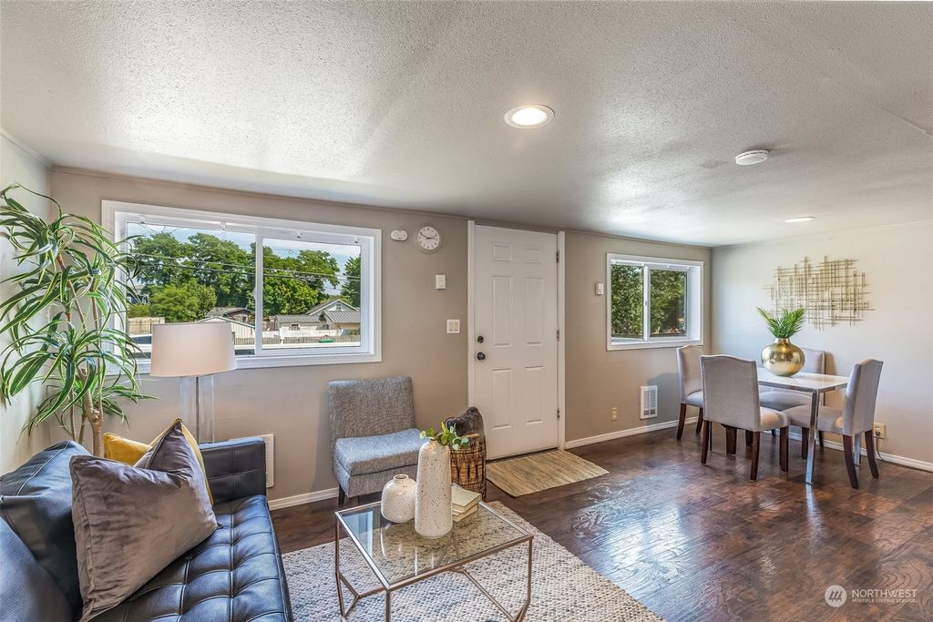 Photo of 10757 18th Avenue SW, Seattle, WA 98146 (MLS # 2132930)