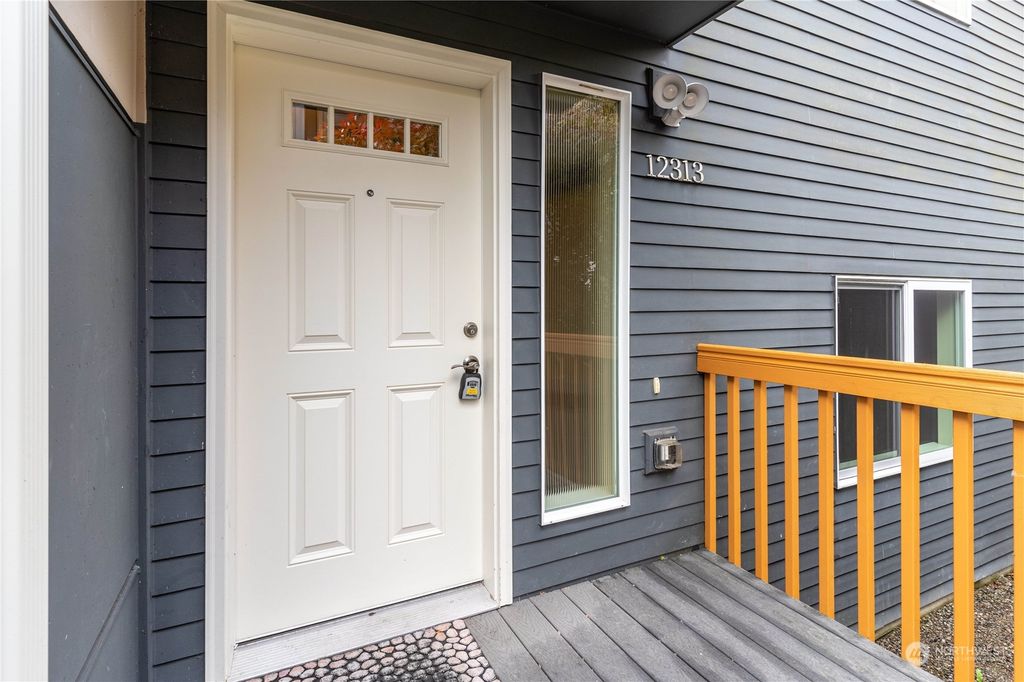 Photo of 12313 Sand Point Way NE, Seattle, WA 98125 (MLS # 2322045)