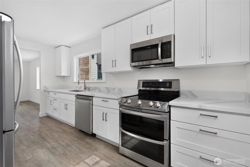 Photo of 3023 SW Charlestown Street, Seattle, WA 98126 (MLS # 2582609)