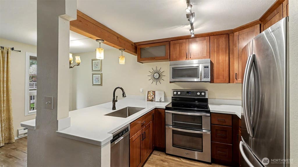 Photo of 17425 119th Lane SE #D22, Renton, WA 98058 (MLS # 2569164)