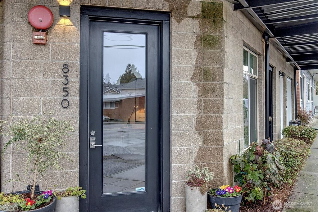 Photo of 8350 28th Avenue NW, Seattle, WA 98117 (MLS # 2333699)