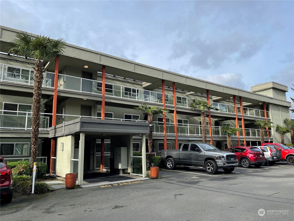 Photo of 701 122nd Avenue NE #405, Bellevue, WA 98005 (MLS # 2034243)