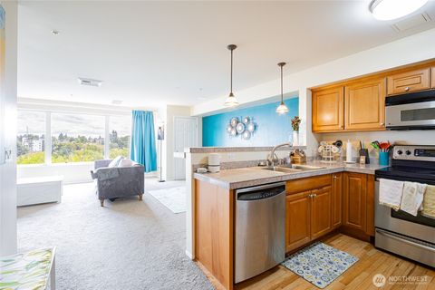Photo of 3201 Pacific Avenue #403, Tacoma, WA 98418 (MLS # 2471175)