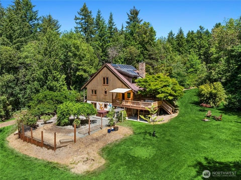 Photo of 9641 Mandus Olson Road NE, Bainbridge Island, WA 98110 (MLS # 2567738)