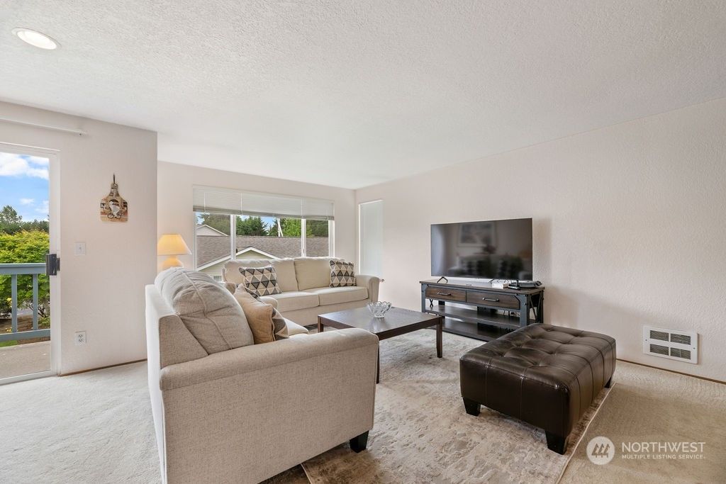Photo of 20617 28th Avenue W #F8, Lynnwood, WA 98036 (MLS # 2074837)