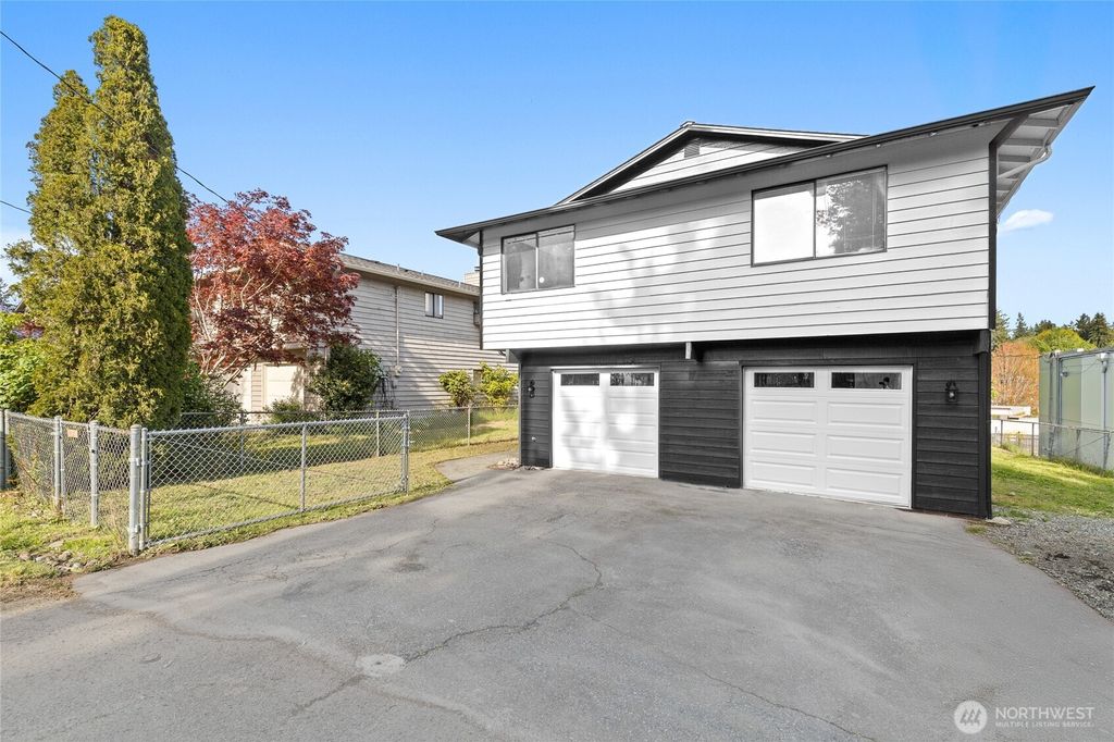 Photo of 13012 31st Avenue NE, Seattle, WA 98125 (MLS # 2369320)