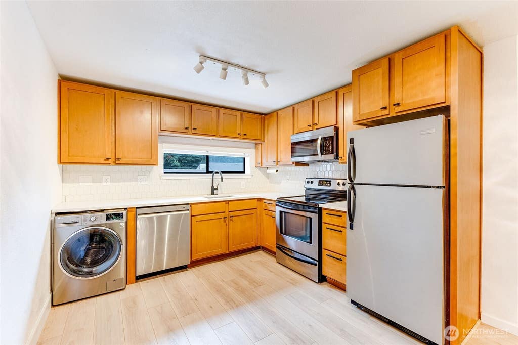 Photo of 23405 16th Avenue S #C203, Des Moines, WA 98198 (MLS # 2568993)