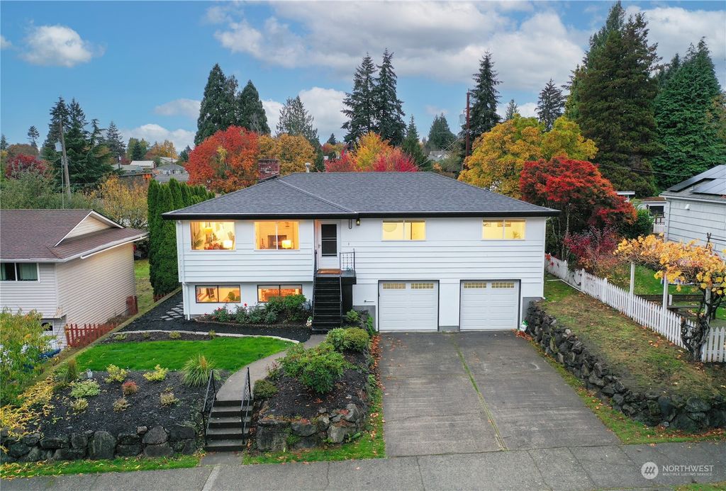 Photo of 7927 30th Avenue SW, Seattle, WA 98126 (MLS # 2303385)