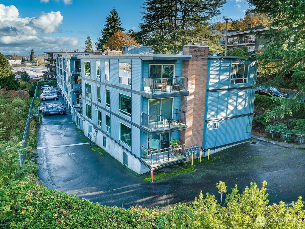 Photo of 3200 W Commodore Way #101, Seattle, WA 98199 (MLS # 2335429)