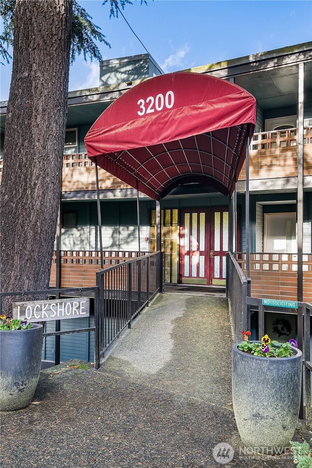 Photo of 3200 W Commodore Way #101, Seattle, WA 98199 (MLS # 2335429)