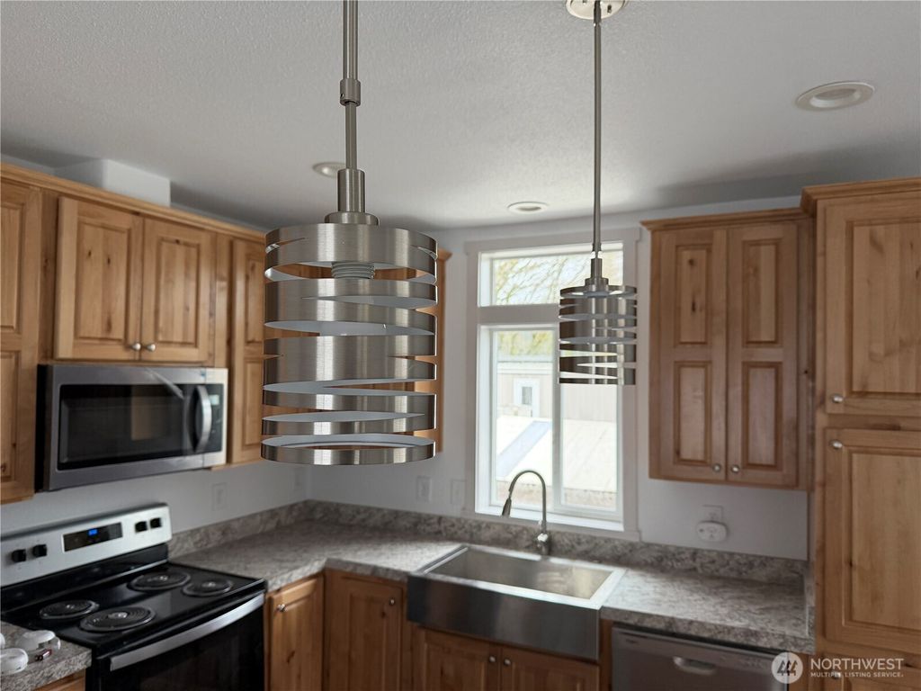 Photo of 7301 NE 175th Street #115, Kenmore, WA 98028 (MLS # 2501026)