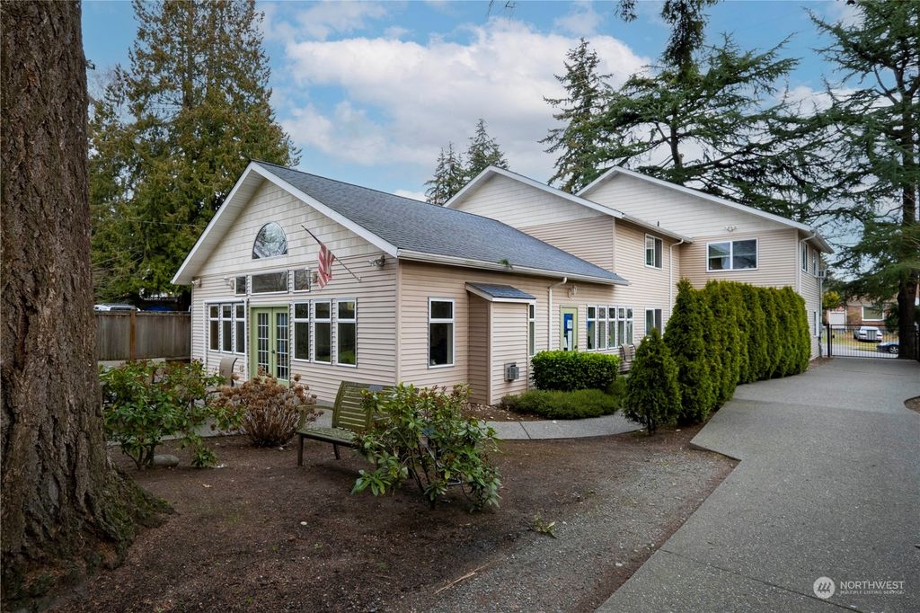 Photo of 11339 8th Avenue NE, Seattle, WA 98125 (MLS # 2032620)