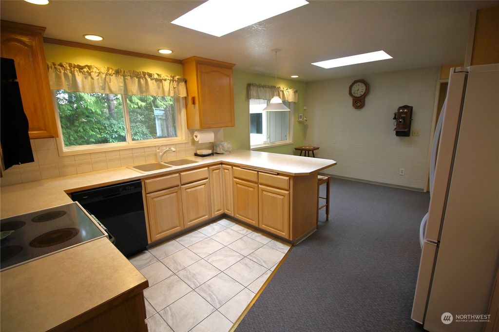 Photo of 10725 SE 244th Street, Kent, WA 98030 (MLS # 2229008)