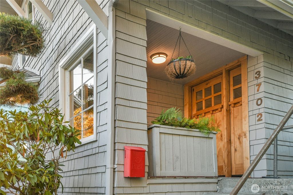 Photo of 3702 SW Cloverdale Street, Seattle, WA 98126 (MLS # 2434230)