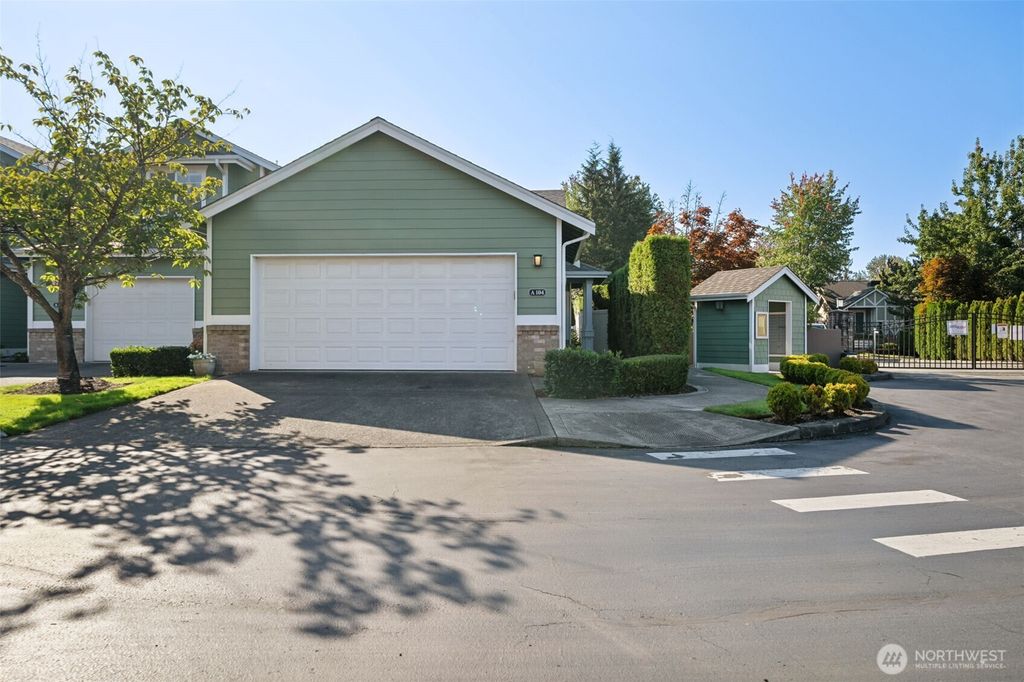 Photo of 10700 SE 260th Street #A104, Kent, WA 98030 (MLS # 2436823)