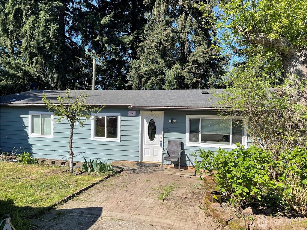 Photo of 10011 11th Avenue SW, Seattle, WA 98146 (MLS # 2355833)