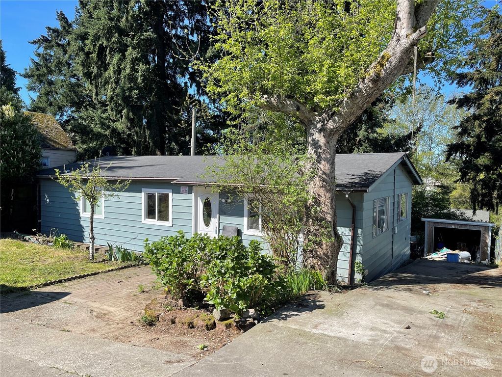 Photo of 10011 11th Avenue SW, Seattle, WA 98146 (MLS # 2355833)