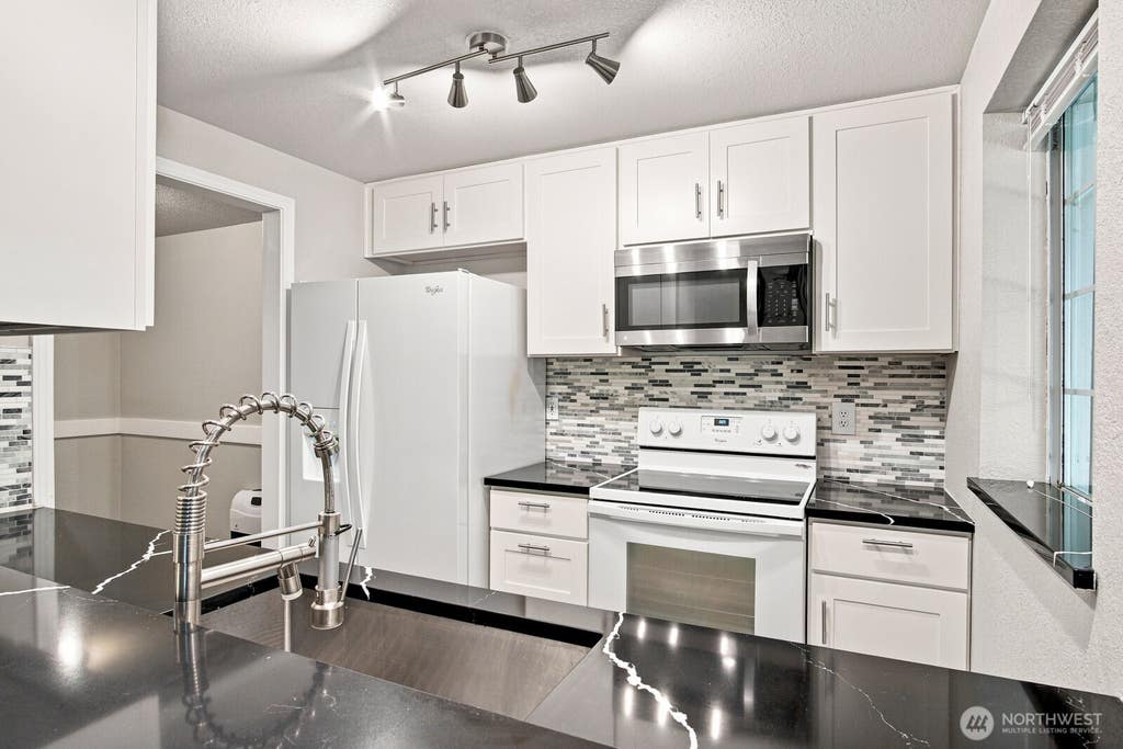 Photo of 15433 Country Club Drive #E103, Mill Creek, WA 98012 (MLS # 2567847)