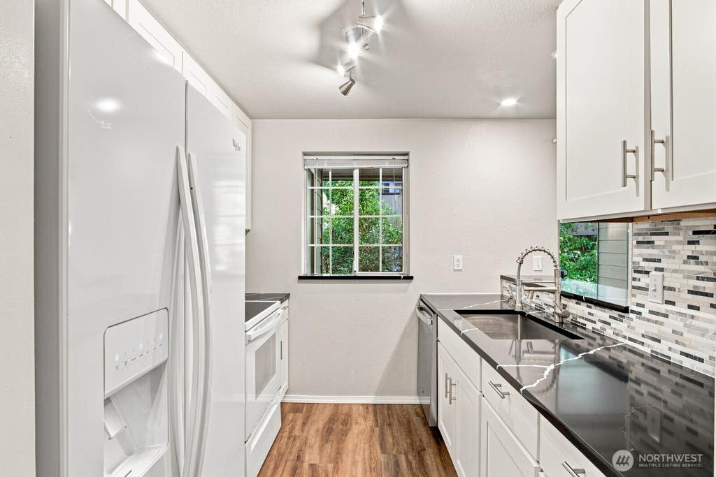 Photo of 15433 Country Club Drive #E103, Mill Creek, WA 98012 (MLS # 2567847)
