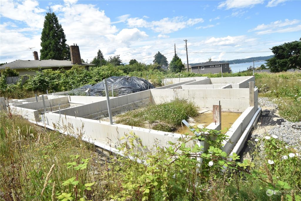 Photo of 8633 E Side Drive NE, Tacoma, WA 98422 (MLS # 2132031)