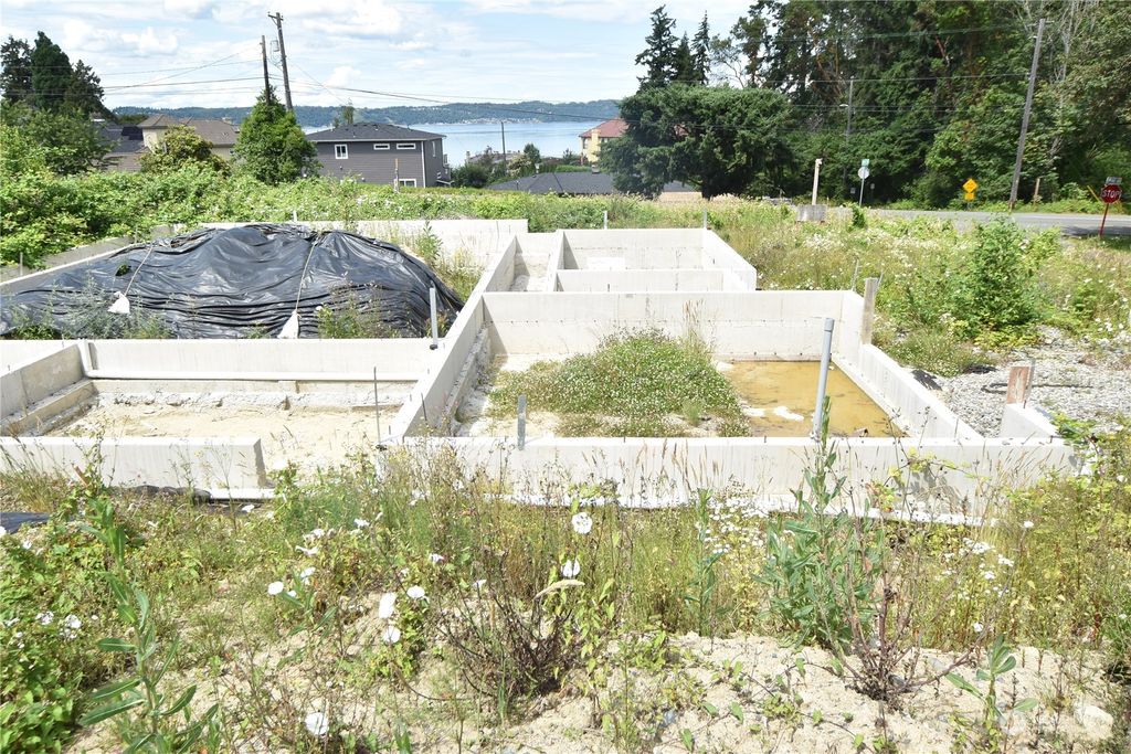 Photo of 8633 E Side Drive NE, Tacoma, WA 98422 (MLS # 2132031)