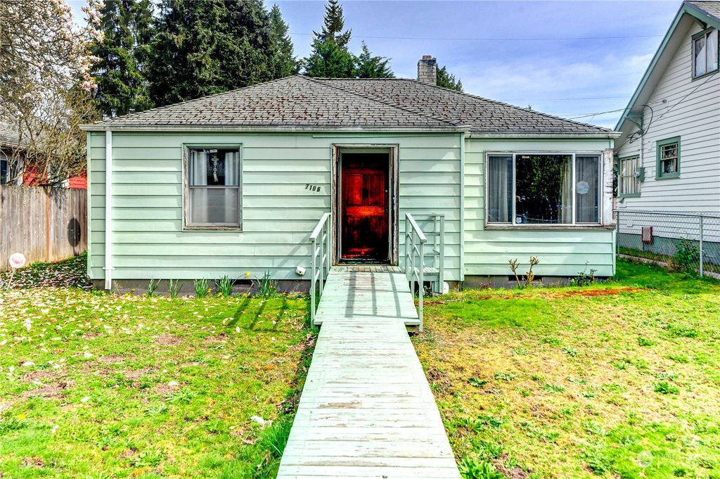 Photo of 7106 32nd Avenue SW, Seattle, WA 98126 (MLS # 2218810)