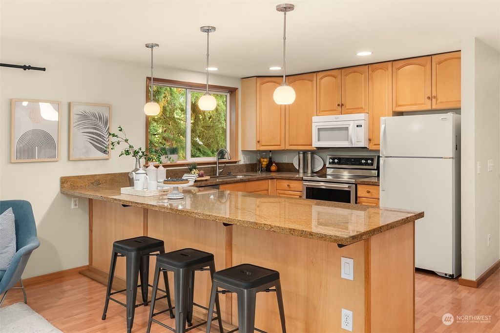 Photo of 4807 NE 7th Place, Renton, WA 98059 (MLS # 2243900)