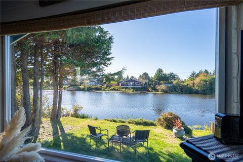 Photo of 213 Canal Drive NE, Ocean Shores, WA 98569 (MLS # 2445476)