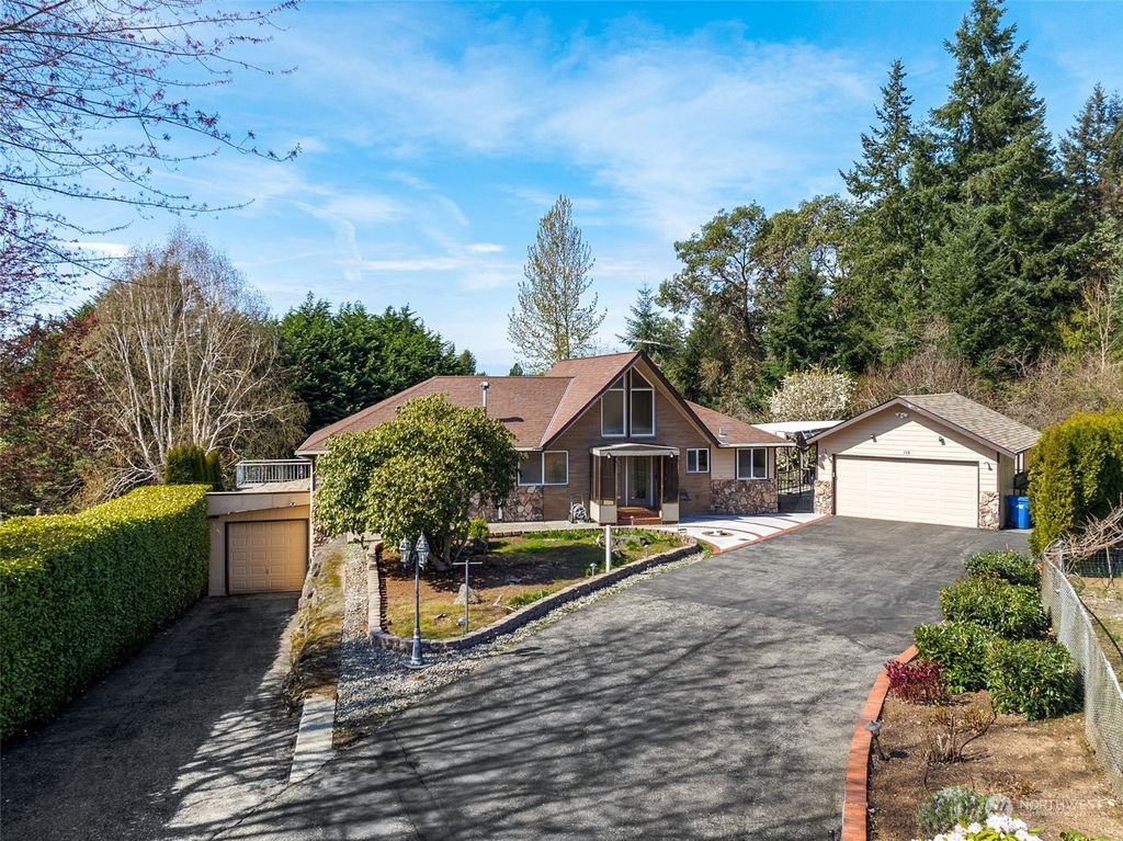 Photo of 130 SW 194th Street, Normandy Park, WA 98166 (MLS # 2217954)