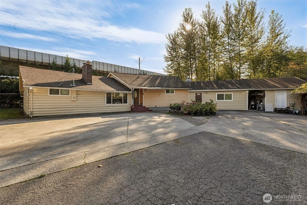 Photo of 13718 Macadam Drive S, Tukwila, WA 98168 (MLS # 2449018)