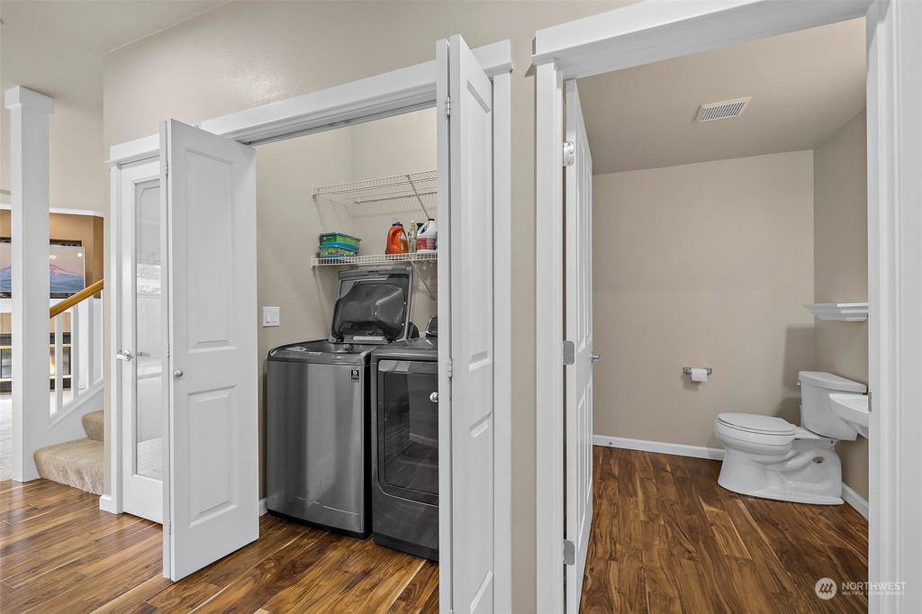 Photo of 10700 SE 260th Street #D103, Kent, WA 98030 (MLS # 2222470)