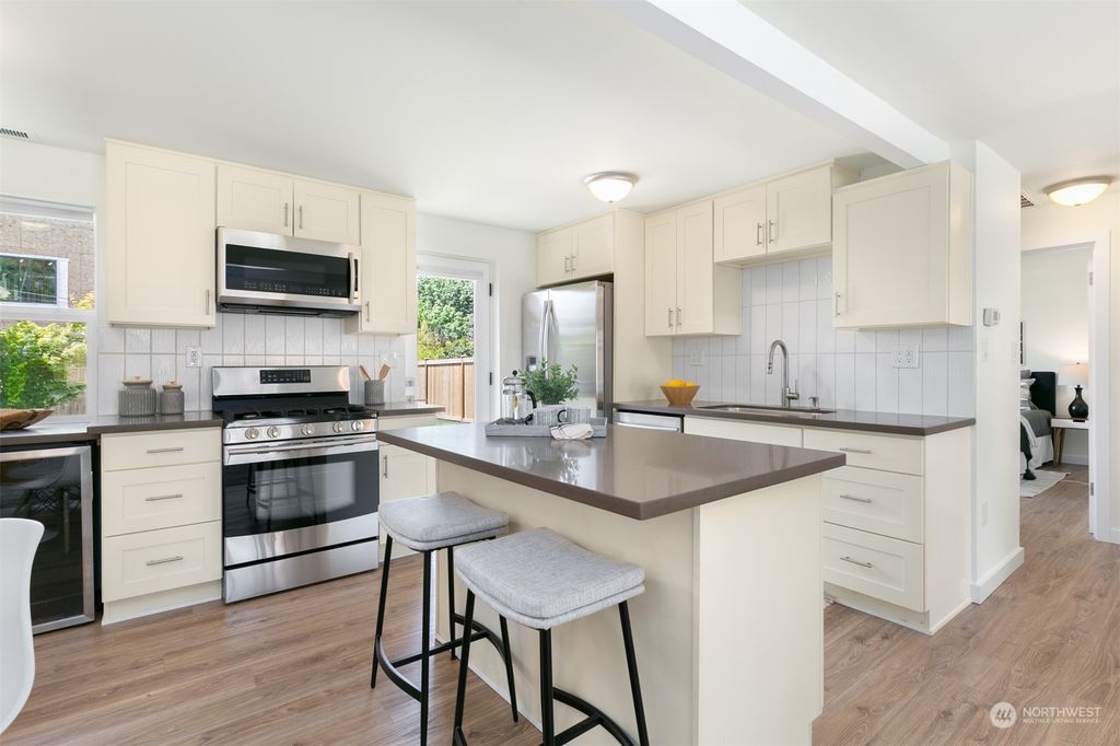 Photo of 11733 4th Avenue NW, Seattle, WA 98177 (MLS # 2071880)