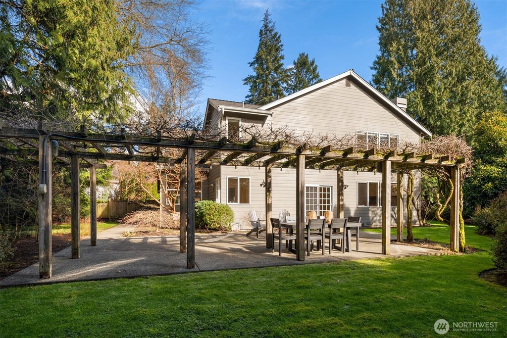 Photo of 10647 Woodhaven Lane, Bellevue, WA 98004 (MLS # 2489515)
