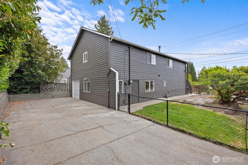 Photo of 8803 15th Avenue NE, Seattle, WA 98115 (MLS # 2538865)