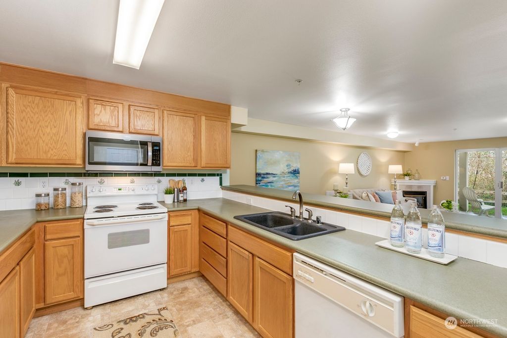 Photo of 2001 120th Place SE #6-103, Everett, WA 98208 (MLS # 2314969)