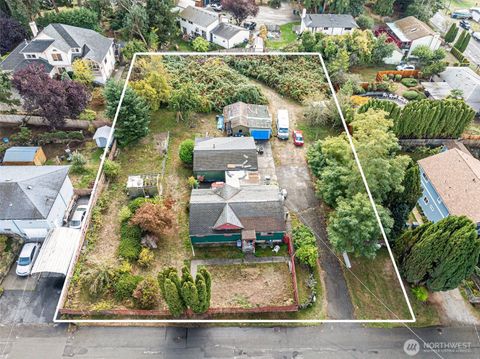 Photo of 2635 SW 104th Street, Seattle, WA 98146 (MLS # 2445859)