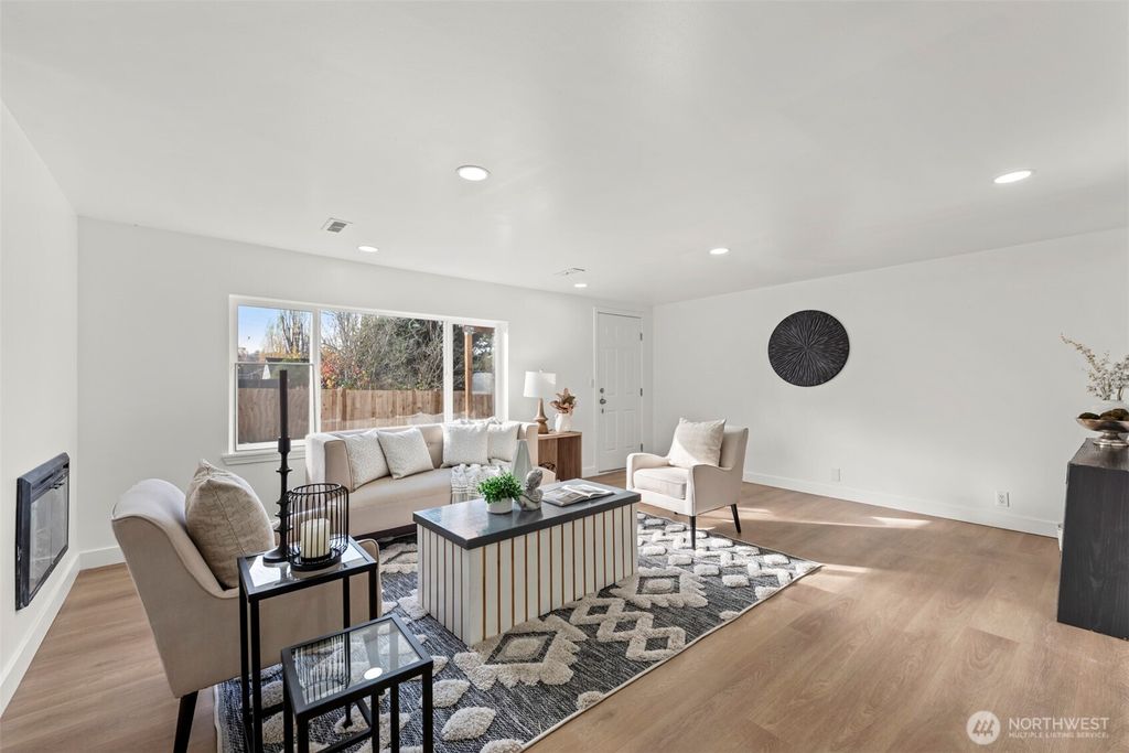 Photo of 8305 Duncan Ave S Ave, Seattle, WA 98118 (MLS # 2506395)