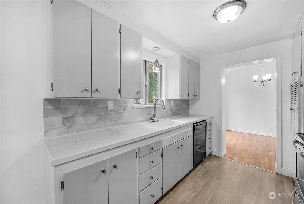 Photo of 15017 Ashworth Avenue N, Shoreline, WA 98133 (MLS # 2042795)