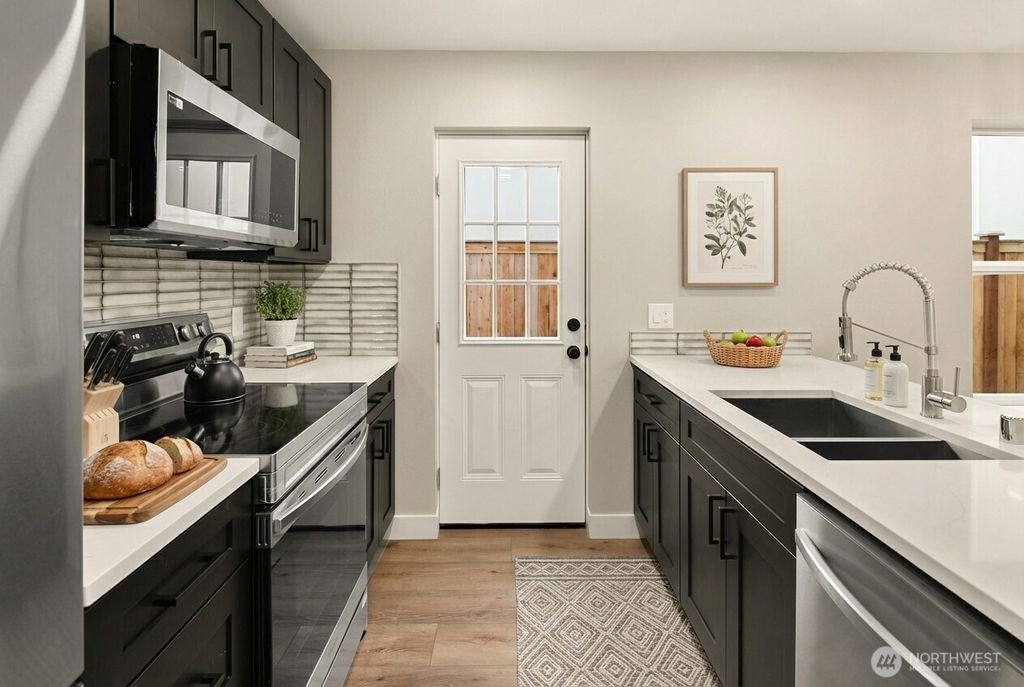 Photo of 13005 1st Avenue NE, Seattle, WA 98125 (MLS # 2492844)