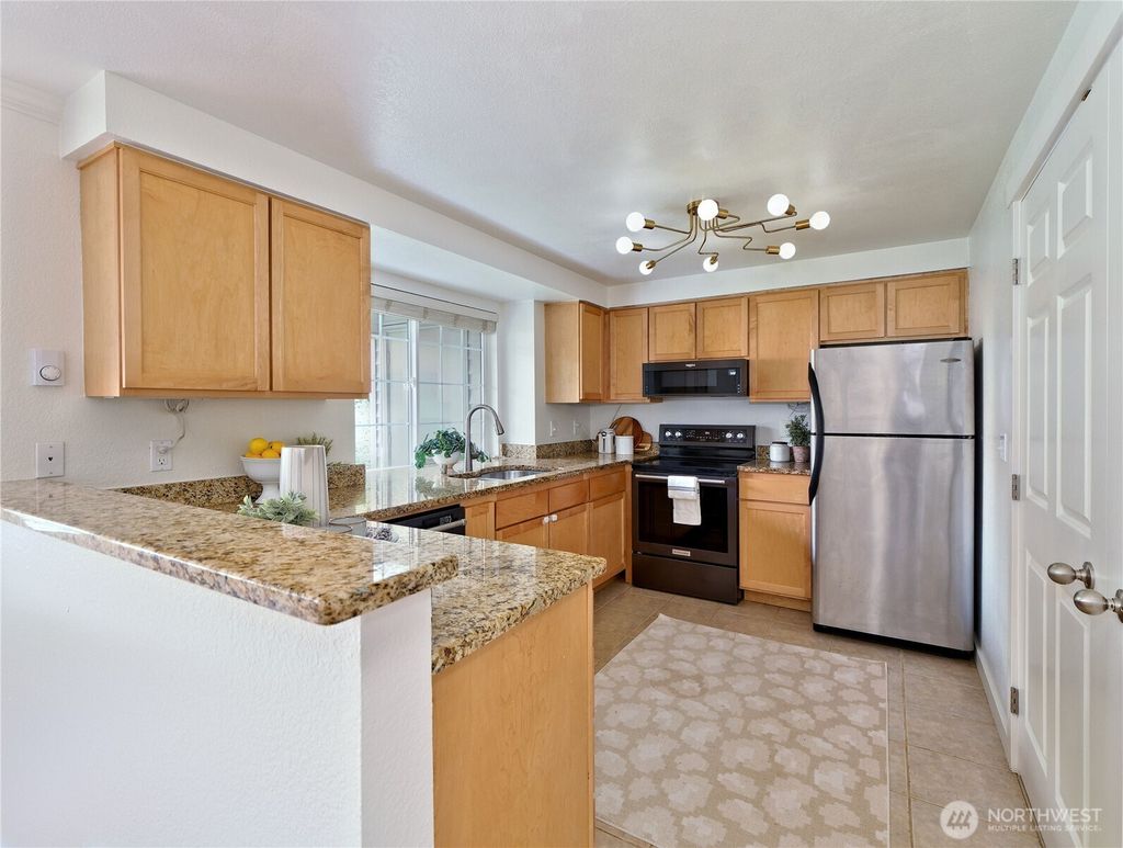 Photo of 10016 NE 120th Lane #F-101, Kirkland, WA 98034 (MLS # 2479933)