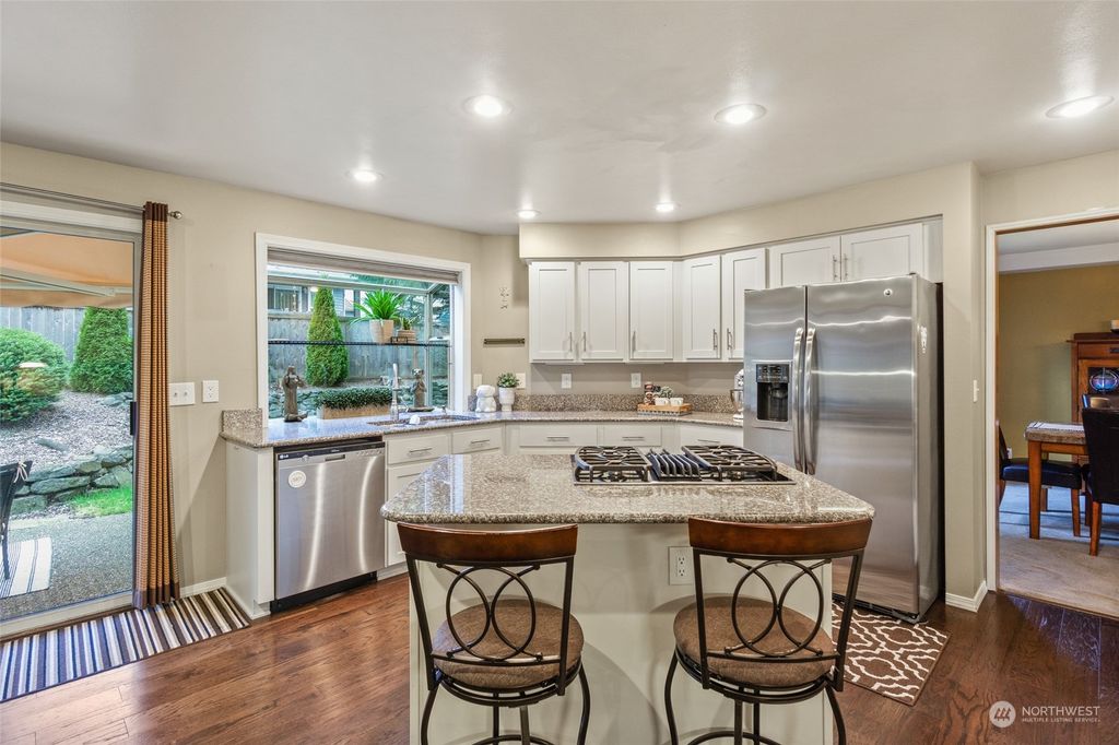 Photo of 21421 129th Place SE, Kent, WA 98031 (MLS # 2212396)