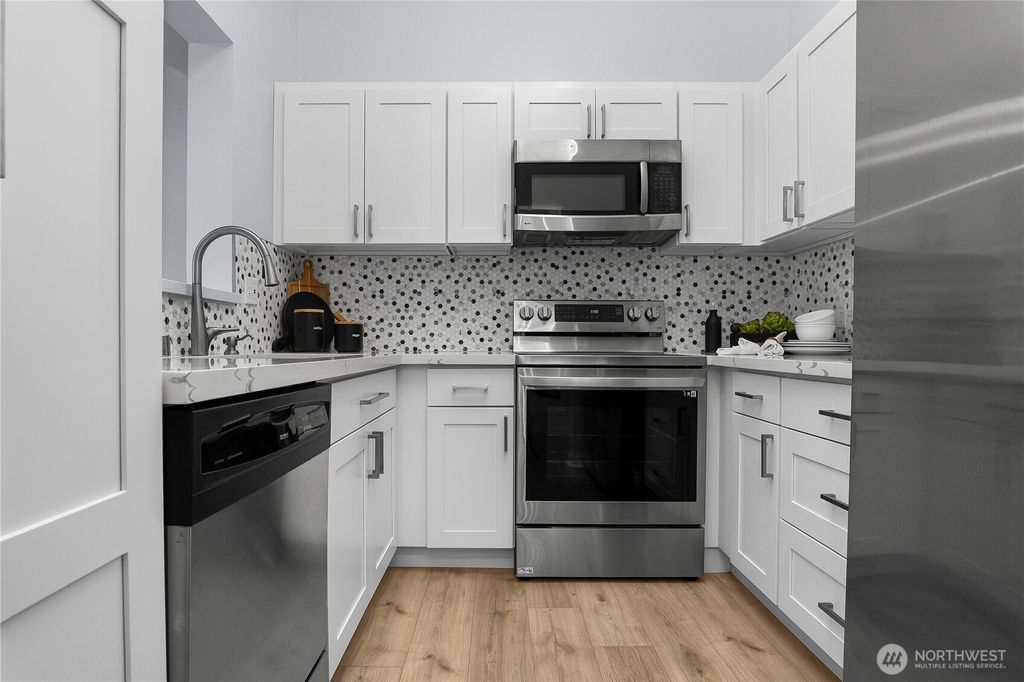 Photo of 12905 126th Court NE #L205, Kirkland, WA 98034 (MLS # 2469595)