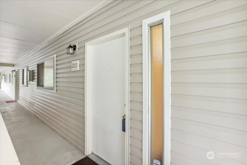 Photo of 14475 NE 40th Street #E203, Bellevue, WA 98007 (MLS # 2147989)