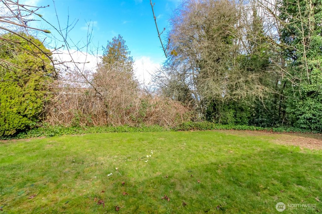 Photo of 1434 S 103rd Street, Seattle, WA 98168 (MLS # 2480389)