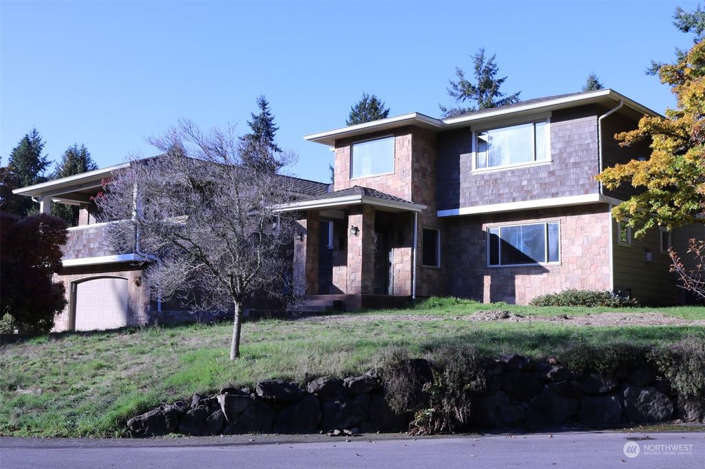Photo of 310 SW 203rd St St, Normandy Park, WA 98166 (MLS # 2180219)