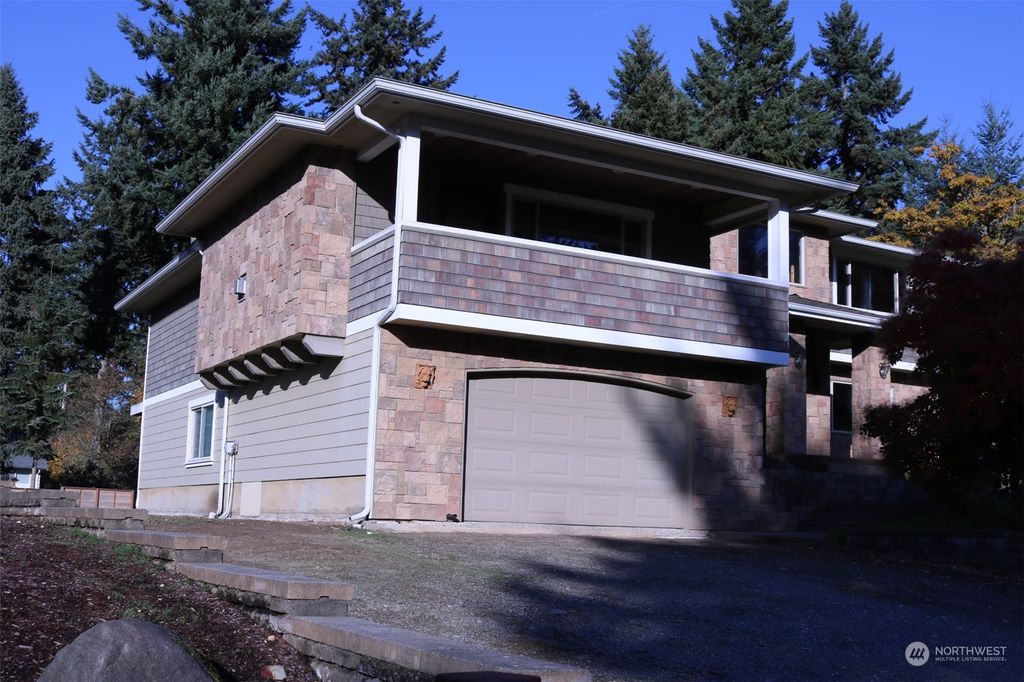 Photo of 310 SW 203rd St St, Normandy Park, WA 98166 (MLS # 2180219)