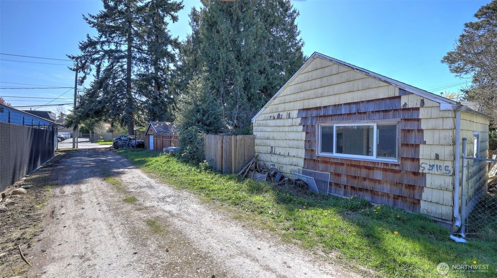 Photo of 8650 10th Avenue SW, Seattle, WA 98106 (MLS # 2505581)